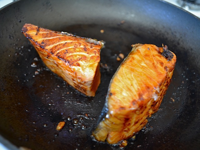 salmon turned on side to cook all sides 