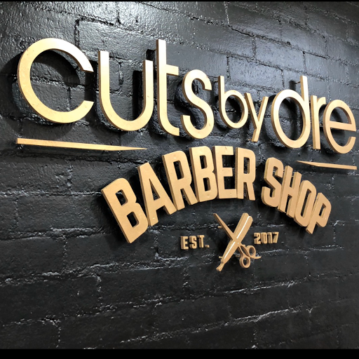 Cuts by Dre Barbershop logo