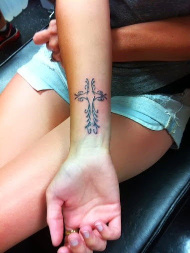 small cross wrist tattoos