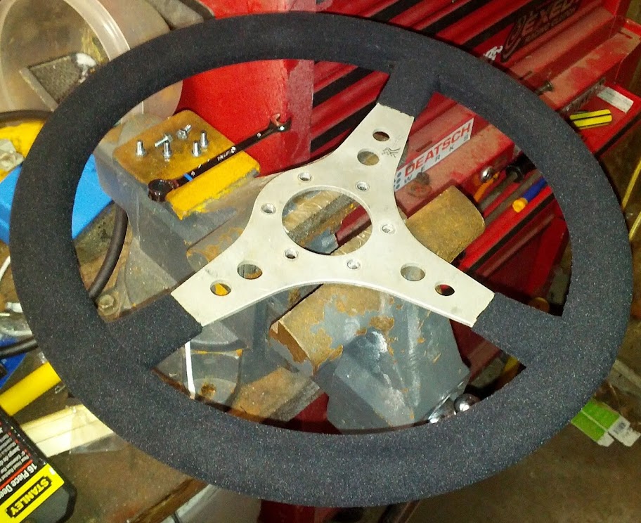 My reupholstering of a steering wheel...