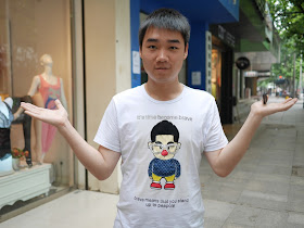 young man wearing shirt with text 'It's time become brave. brave means that you stand up to peapole"