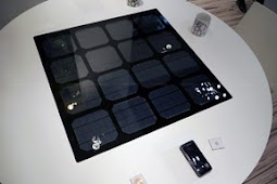 الشحن اللاسلكي باناسونيك الجدول يظهر قبالة تعمل بالطاقة الشمسية الجدول اللاسلكية الشحن wireless charging table Panasonic shows off solar-powered wireless charging table