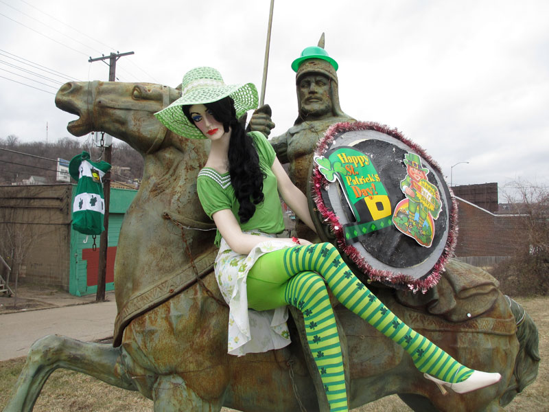 With green hat, mannequin in shamrock tights and green outfit