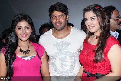 Anjali, Arya and Hansika Motwani get clicked during the audio launch of their movie 'Settai', held at Sathyam Cinemas in Chennai.