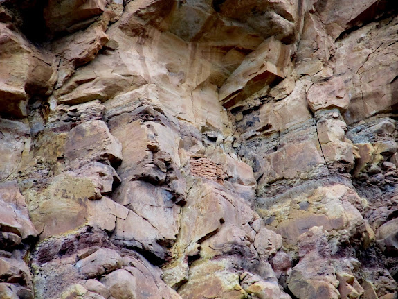 Granary hidden high in some cliffs