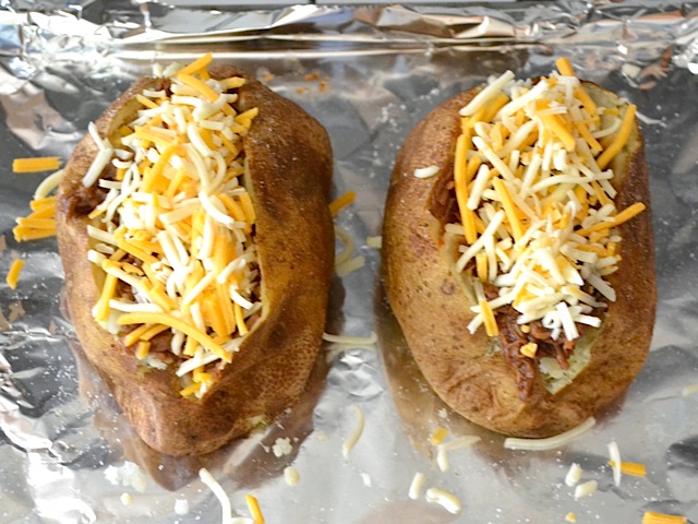 shredded cheese added to top of each potato 