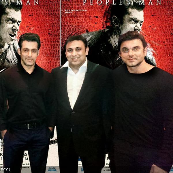 Salman Khan and Sohail Khan poses for a photo with Parvez Khan(C) during the world premiere of his movie Jai Ho in Dubai.