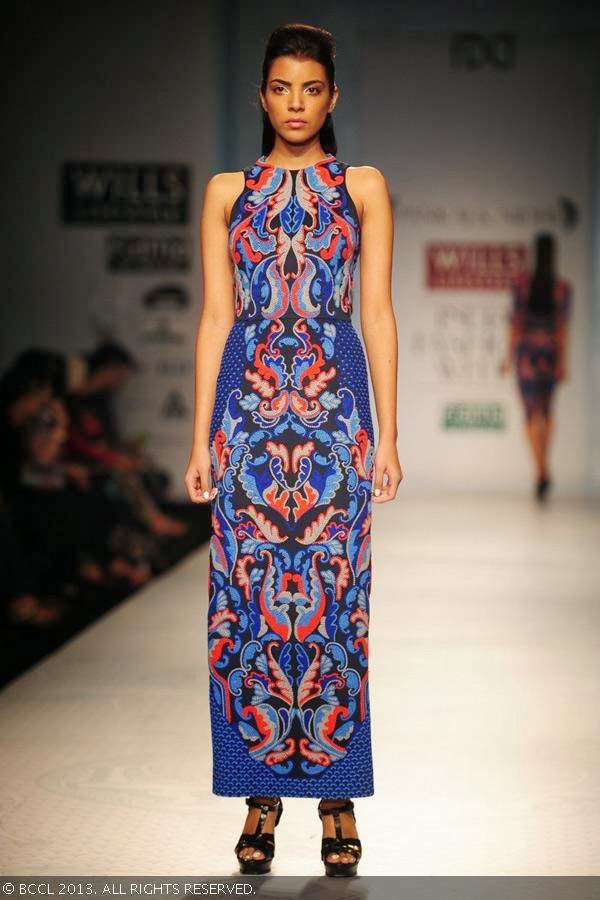 A model walks the ramp for designer duo Pankaj and Nidhi on Day 2 of the Wills Lifestyle India Fashion Week (WIFW) Spring/Summer 2014, held in Delhi.