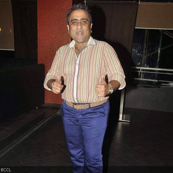 Popular playback singer Kunal Ganjawala in a jovial mood during the music launch of the movie Huff! It's Too Much, held in Mumbai, on October 9, 2013. (Pic: Viral Bhayani)