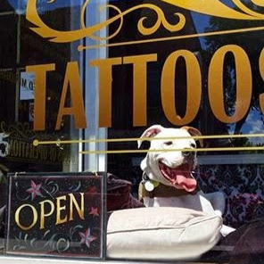 Dog House Ink Custom Tattoos and Body Piercing logo