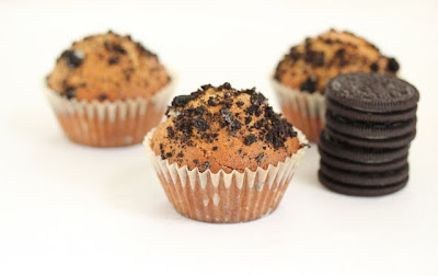 photo of three Oreo muffins with a stack of oreos