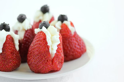 close-up photo of Mascarpone Stuffed Strawberries on a plate