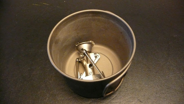 The new MicroRocket will lie down flat in a small mug type pot.