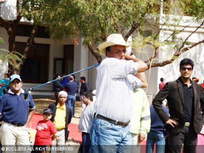 Bhupendra Mandaliya, swinging at the inauguration of the Kensville golf club, off Ahmedabad. 