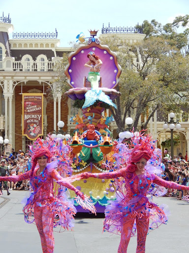 New Disney World Parade: Festival of Fantasy. Ariel floats in on a clamshell pulled by her fishy friends. 