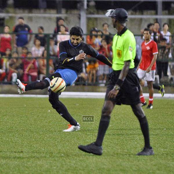 Abhishek Bachchan in action during a charity soccer match organised by Aamir's daughter Ira Khan, at Cooperage ground, on July 20, 2014.(Pic: Viral Bhayani)