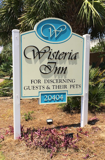 Wisteria Inn logo