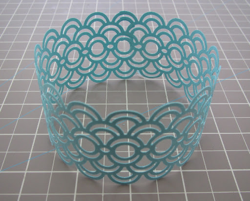 Secure the ends of each strip together with clear tape.