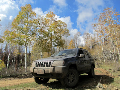 Muddy Jeep parked at the head of Seeley Canyon