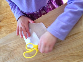 Making paper snow flakes is a classic winter activity that kids love.  Did you know it teaches math too?