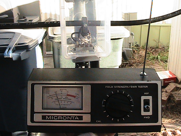 The
                      capacitor is first adjusted for maximum received
                      noise on the operating frequency, then fine tuned
                      for lowest SWR. Tuning for maximum brightness on
                      the the neon lamp coincided with maximum
                      deflection of the field strength meter and was
                      sufficiently close to minimum SWR.