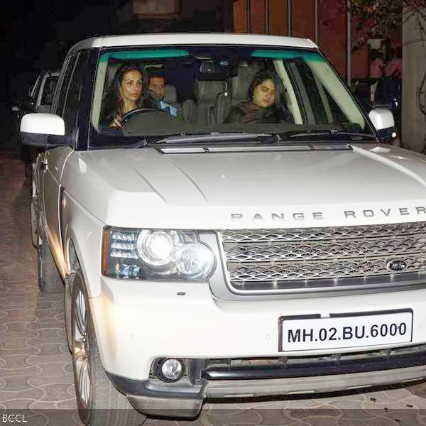 Malaika Arora Khan arrives at the screening of Gunday, held at Yashraj, in Mumbai, on February 13, 2014. (Pic: Viral Bhayani)