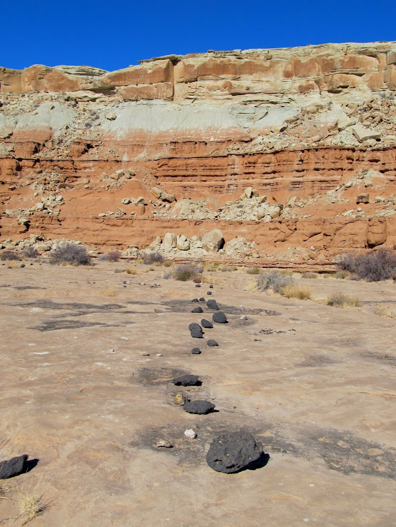 Unusually straight line of basalt rocks