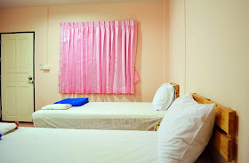 Twin bed of Ban Phunara Resort