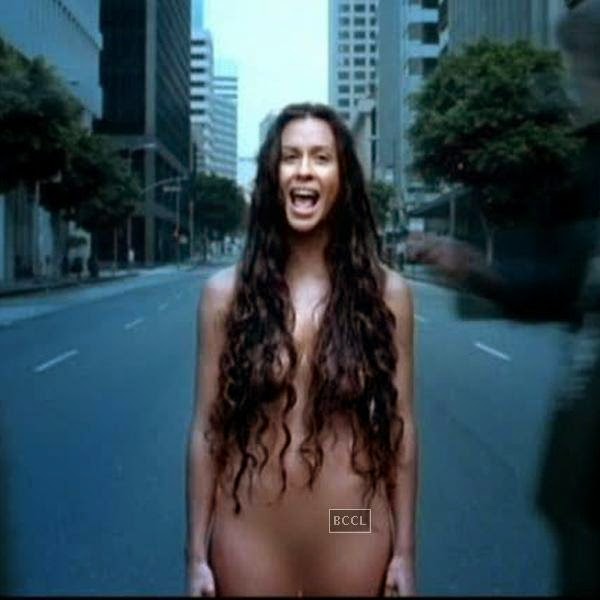 Alanis Morissette got real comfortable shooting while shooting for her video, "Thank You." 