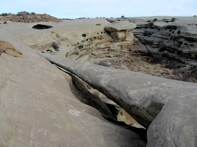 Natural arch in the Curtis Formation, with a span of about 25 feet