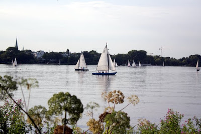 Boats sailing on the Aussen Alster lake in Hamburg Germany