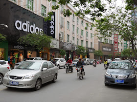 street with adidas store in Yangjiang, China