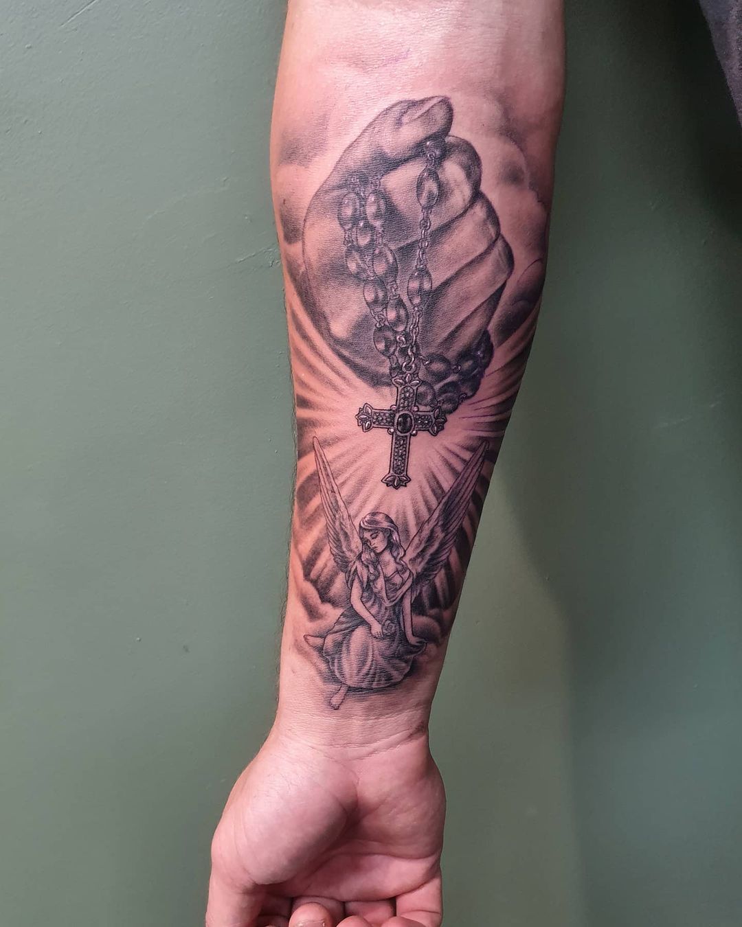 forearm rosary tattoo 