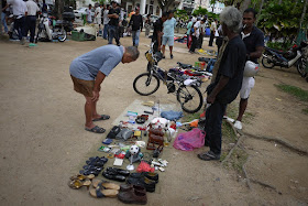 various items for sale at an outdoor market in George Town, Penang, Malaysia