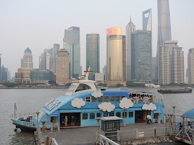 ferry boat with a cloud and sky design in Shanghai