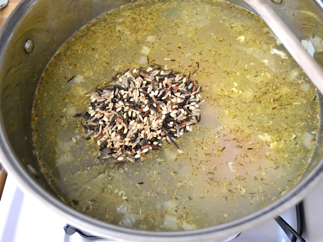 wild rice and water added to pot 