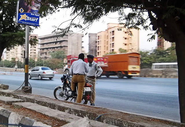 two traffic cops and motorcycle