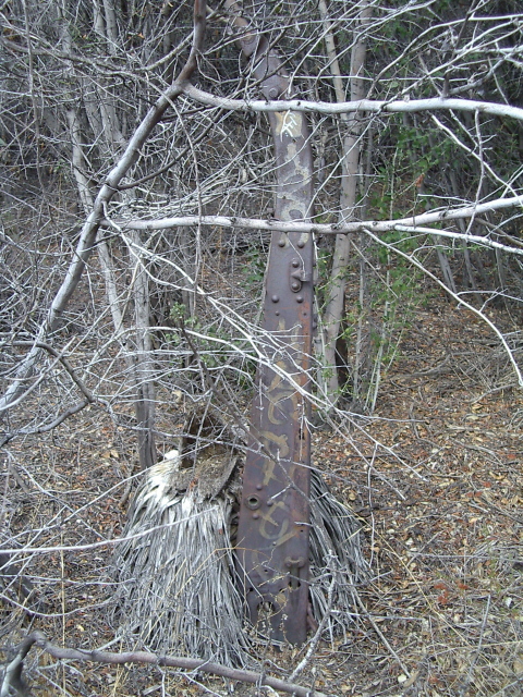 something metal and curved and set in the ground