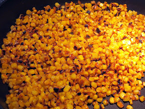 Elote Pasta Salad - pan roasted corn kernels in process