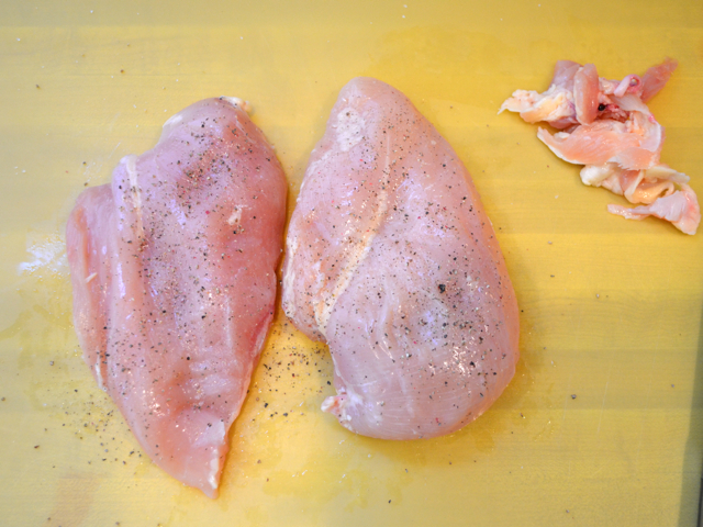 raw chicken breasts with excess fat trimmed off 