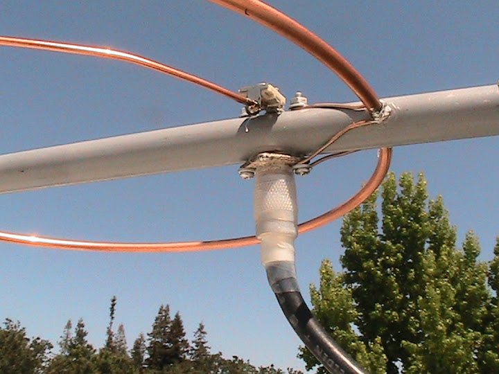 Close
                      up view of the PL-259 antenna connector sealed
                      with Rescue Tape. The open spaces between the boom
                      and the SO-239 connector were sealed with GOOP
                      Plumbing contact adhesive and sealant, selected as
                      it does not release corrosive acetic acid during
                      curing.