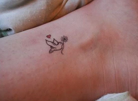 cute dove wrist tattoos