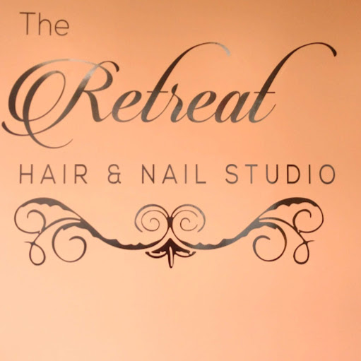 The Retreat Hair & Nail Studio logo