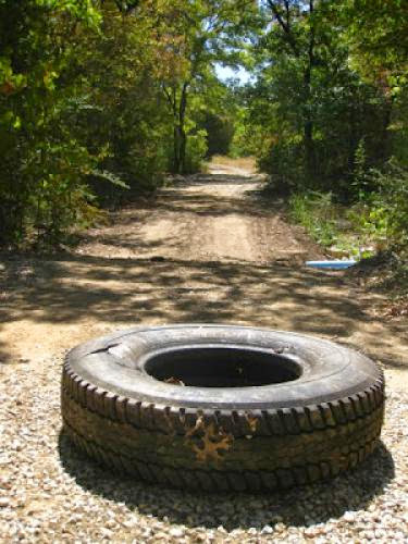 Giant Tires And Bobcats Invade The Parched Tandy Hills