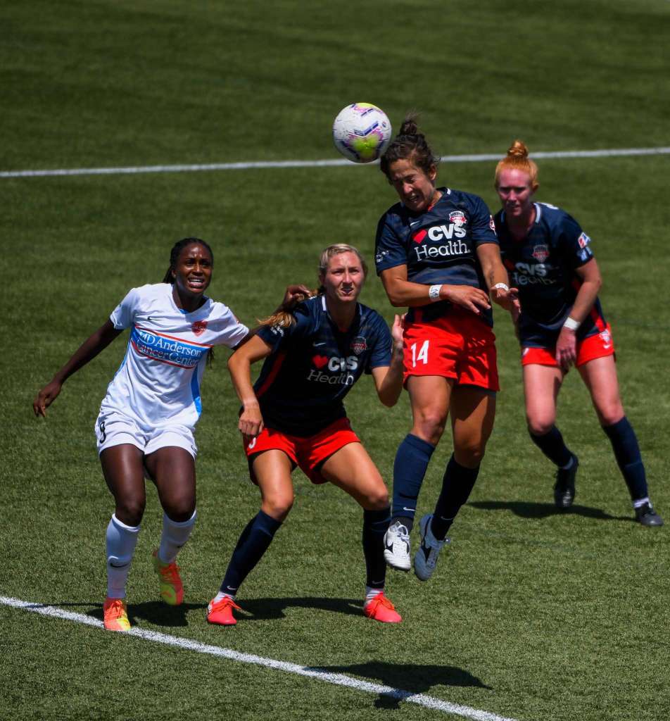 HERRIMAN, UT - JULY 12: Paige Nielsen #14 of Washington Spirit attempts a header during a game against the Houston Dash on day 7 of the NWSL Challenge Cup at Zions Bank Stadium on July 12, 2020 in Herriman,