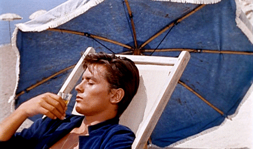 Alain Delon as Tom Ripley drinking the the best under the blazing sun in Plein Soleil 