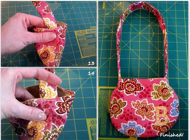 hand holding strap to pin inside purse