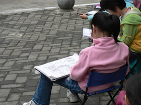 girl drawing buildings in Changsha