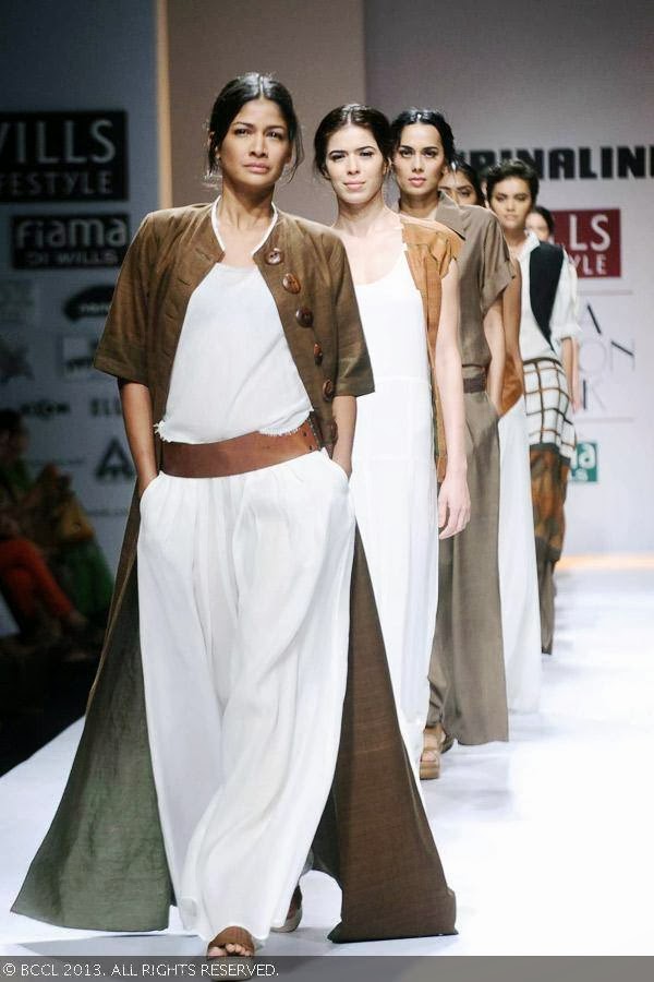 Models walk the ramp for fashion designer Mrinalini on Day 3 of the Wills Lifestyle India Fashion Week (WIFW) Spring/Summer 2014, held in Delhi.