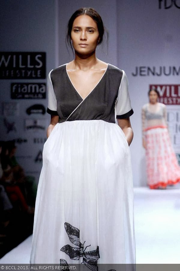 A model flaunts a creation by fashion designer Jenjum Gadi on Day 3 of Wills Lifestyle India Fashion Week (WIFW) Spring/Summer 2014, held in Delhi.